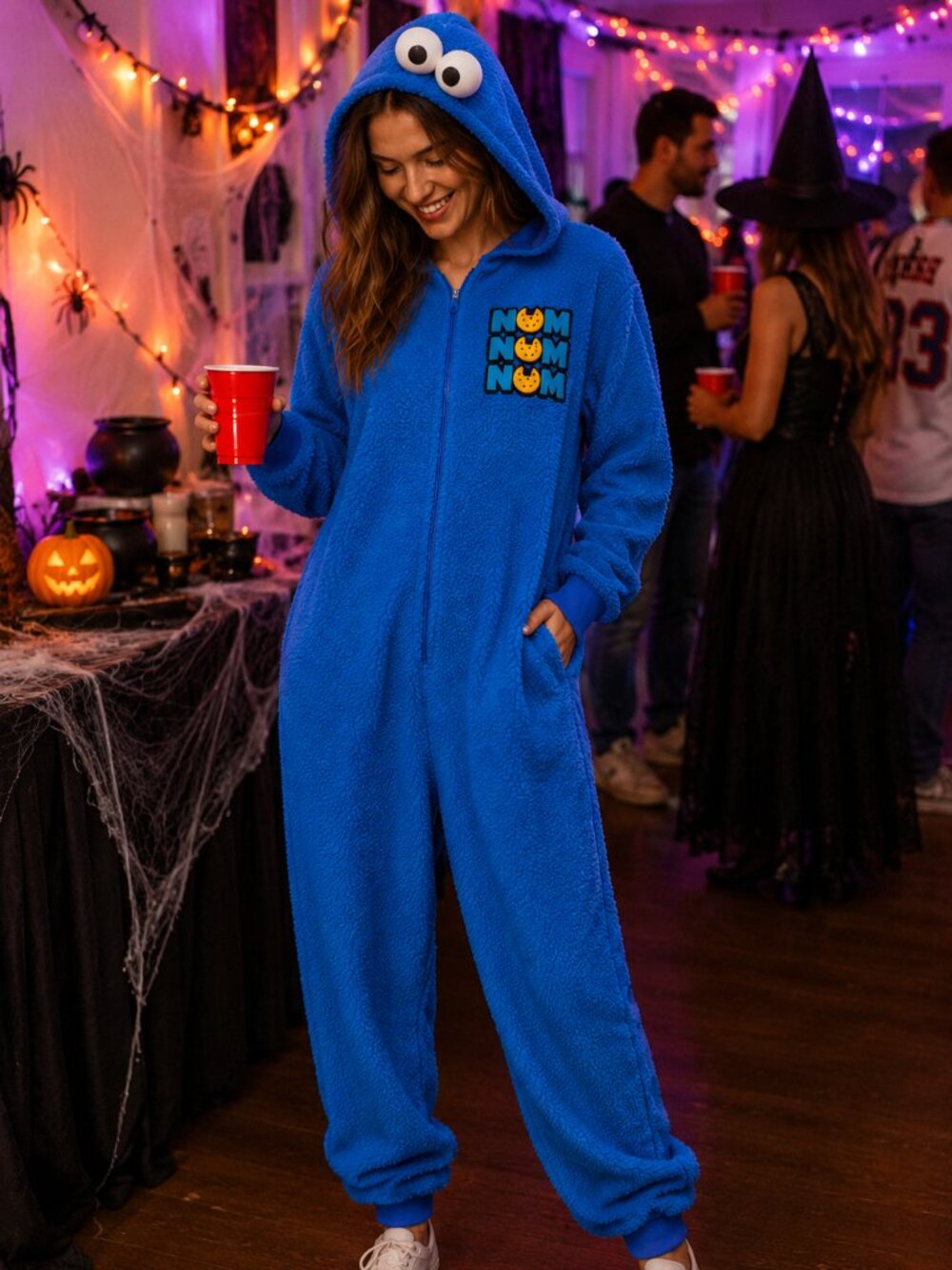 Spirit Halloween Sesame Street Adult Cookie Monster Jumpsuit Costume Onesie S/M
